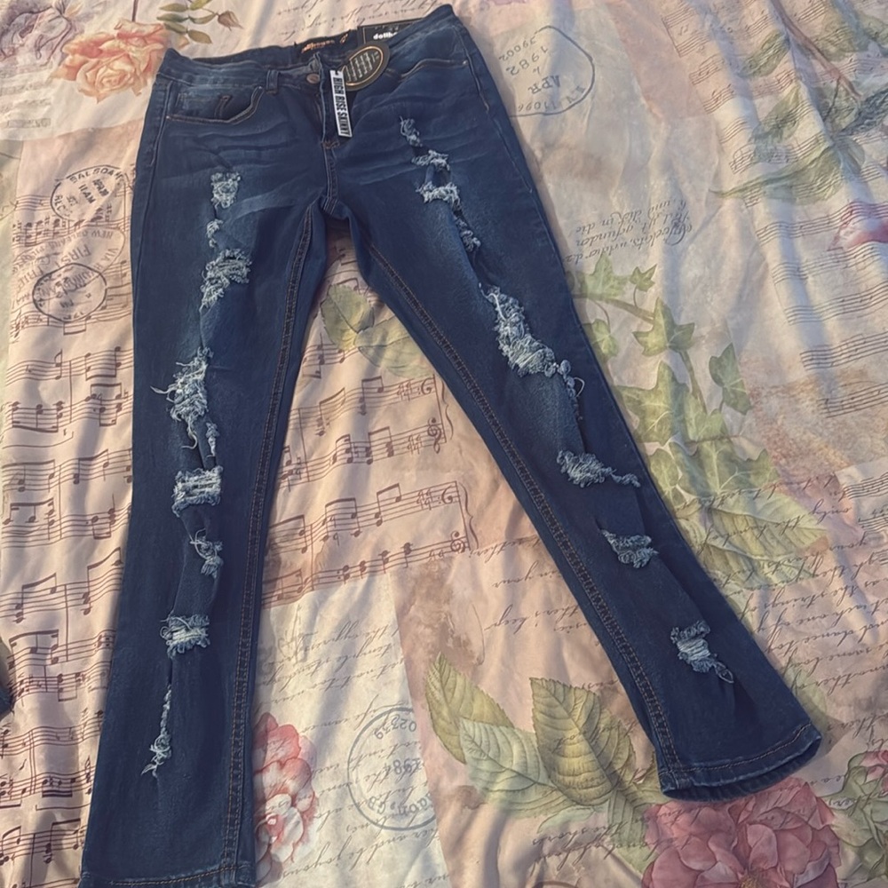Women Dollhouse jeans. New with tags size 11/12